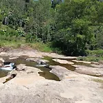 Wonderland Falls And Farm House