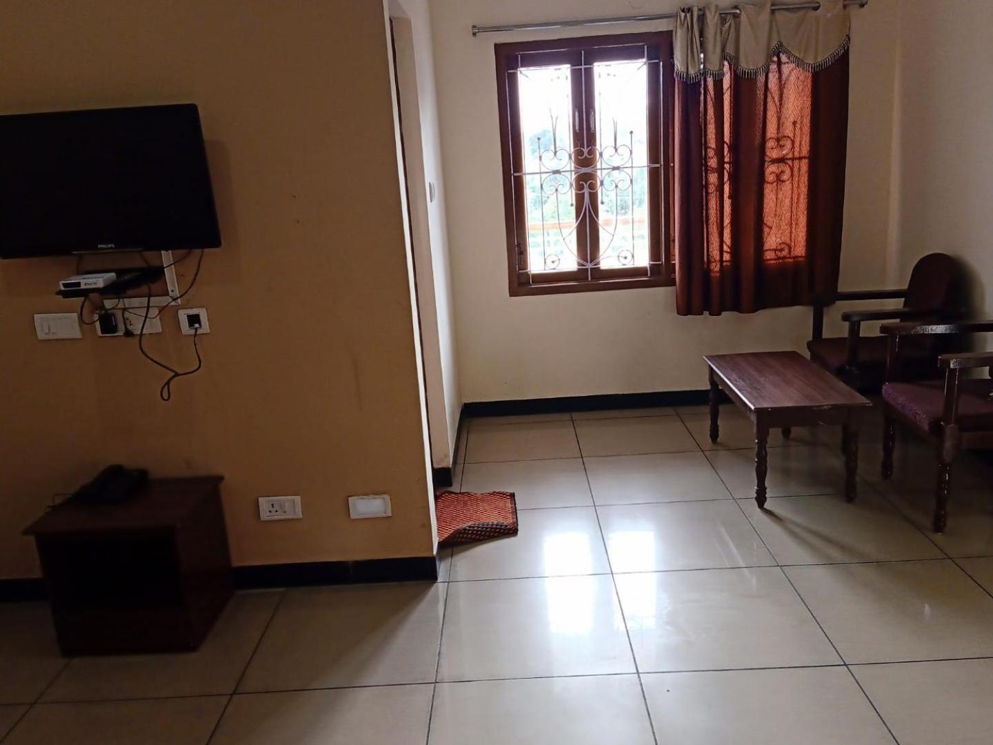 Ezhil Residency Hotel